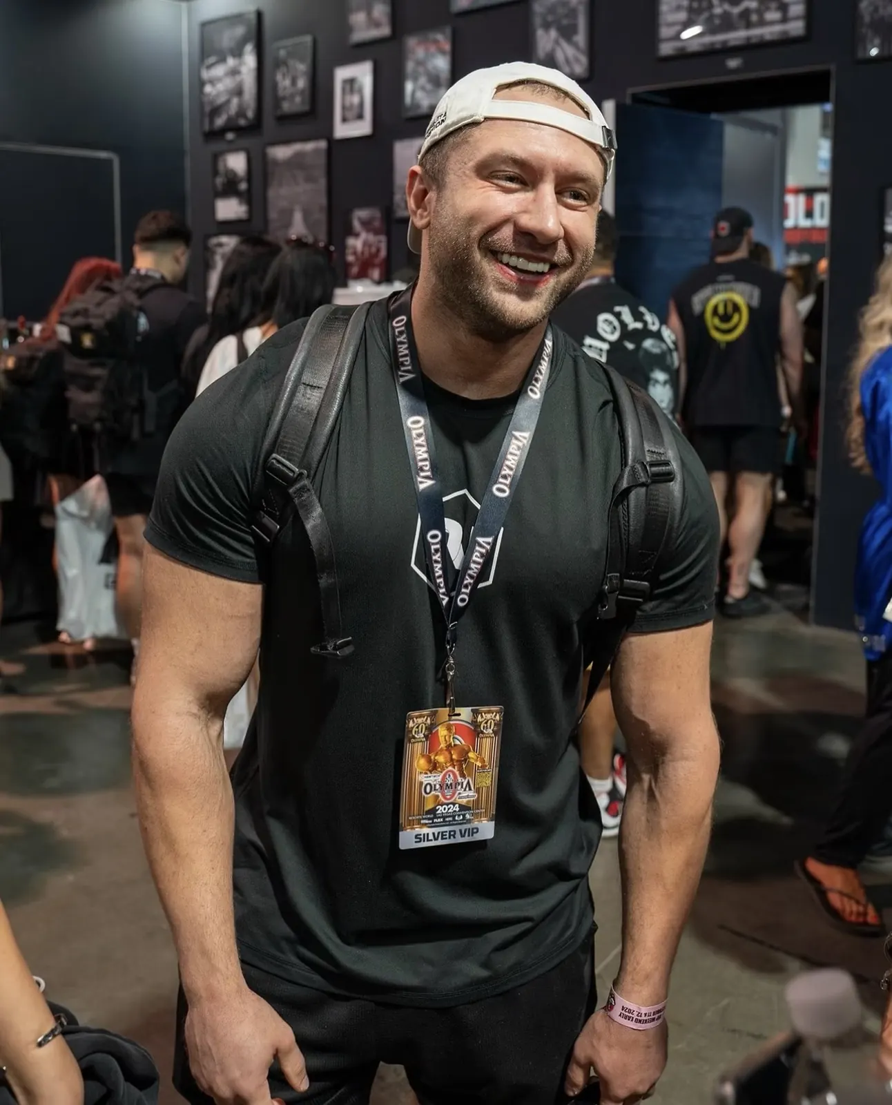 David DeMesquita, founder of Aegis Nutrition, smiling at a bodybuilding show
