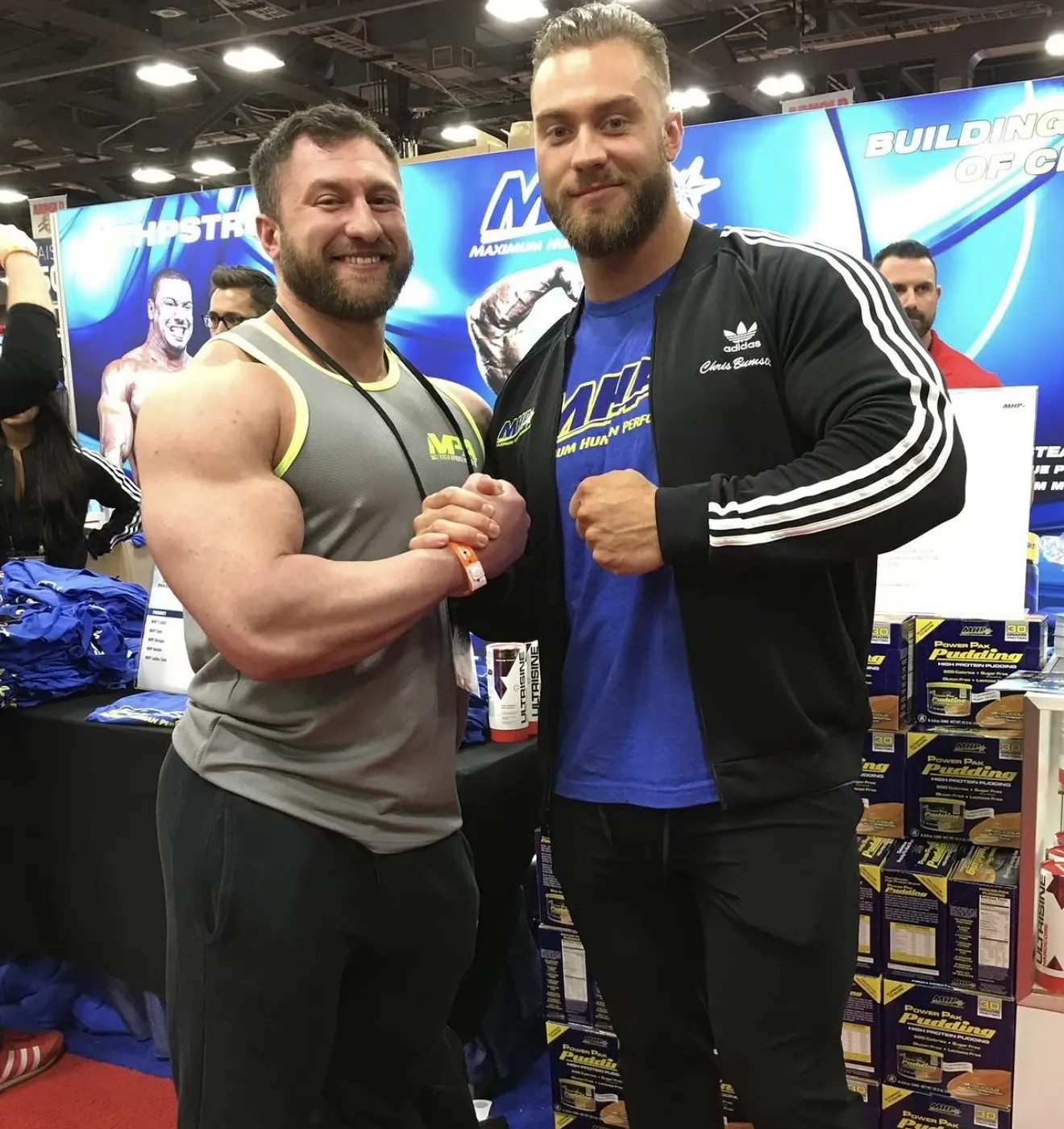 David DeMesquita with an athlete at a fitness expo